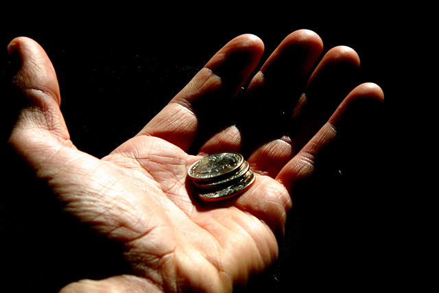 hand with coin in it