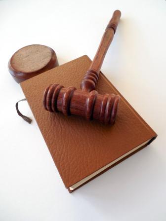 Court attrubutes: hammer and book